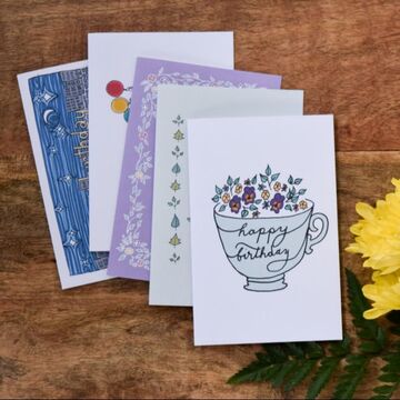 A photo of elegant handmade cards by Elisabeth Young of Irresistible Envelope